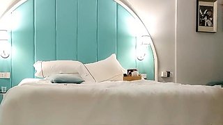 Cute amateur asian web cam girl playing with her toy