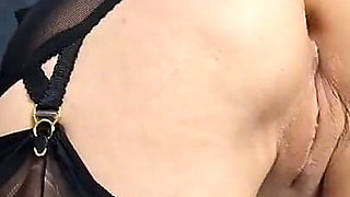 Wanilianna in kinky, glossy boots over seamed genuine nylon stockings