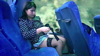 Busty babe caught masturbating on the bus