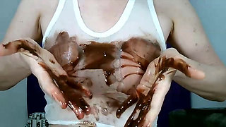 Wetting boobs, tities and nipples with chocolate