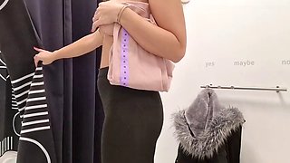 Open curtain in the fitting room public flashing of tits