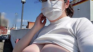 A Frustrated Married Woman Masturbates with Her Legs Open and Her Breasts Exposed in an Outdoor Parking Lot