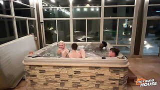 Sexy blonde Ellie Smoke is sucking two cocks in the bathtub