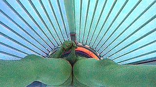 Masturbating in public tanning bed