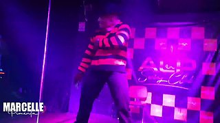 Group of girls having sex with stripper on nightclub stage