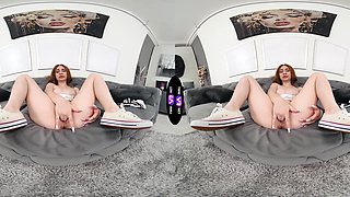 Redhead Vilora Efi enjoys solo sex on the sofa