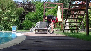 Granny enjoys dildo in garden