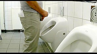 Truckers pissing in autohof toilet