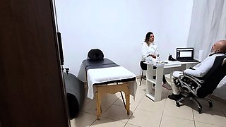 A MILF gets fingered by the proctologist during an anal