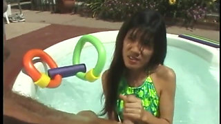 Oriental teen sucking dick by the swimming pool before getting screwed
