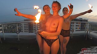 Two beautiful girls are having fun without any panties outdoors