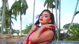 Big ass stunning beauty strips in a pool