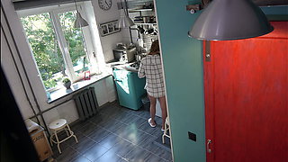 Young blonde sucks old man in the kitchen