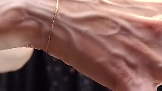 Rebecca Diamante Shows Her Hands' Veins in Topless