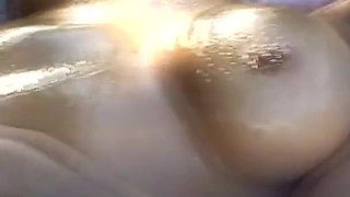 Black Beauty Oiled up - Horny Ebony Babe Gets Soaked & Fucked Hard in Wet Scene