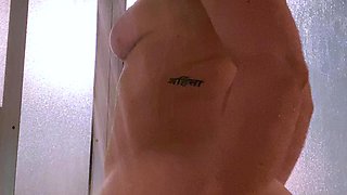 Hot babe with perfect big boobs taking shower