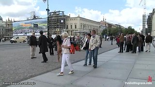 Naked babe pulling charios in public