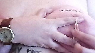 Rubber band fun on my nipples and clit