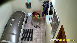 Czech Solarium 54: Blonde Young Woman Strips Down and Flashes Her Pussy