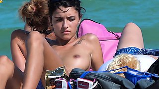 Gorgeous single brunette shows off her tits in public