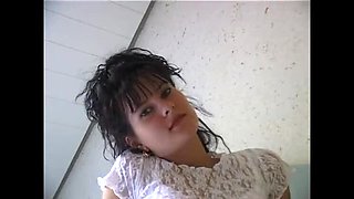 Hairy brunette cutie with small tits rubs her bushy snatch