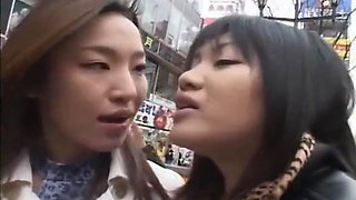 Japanese lesbians kissing on the street then in a hotel room