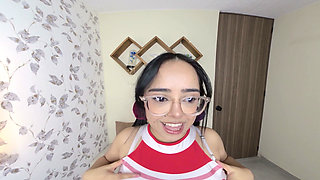 Horny Cheerleader Plays with Her Tits