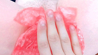 Pussy stretched by a pink doggy bag