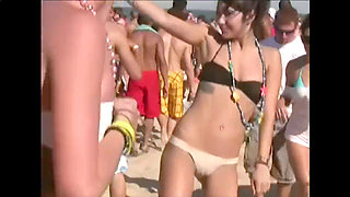 Amateurs with small breasts having fun on the beach