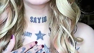 Sexy Alternative Blonde Drinking and Burping
