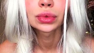 Bodacious young blonde flashing her big tits on webcam