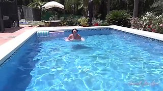 Busty Redhead MILF Jojo Robinson Gets Naked and Fingering Herself by the Pool