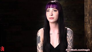Tattooed slave suspended and flogged in dungeon