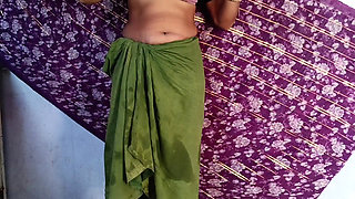 The father-in-law is secretly watching the Indian daughter-in-law cleaning the house in a petticoat, blouse, bra, daughter-in-law is fingering her pussy, yearning for a cock.