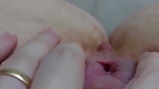 Close up homemade video of a chubby woman fingering her cunt