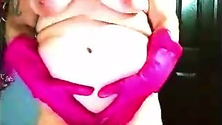 Pink rubber glove pussy fingering